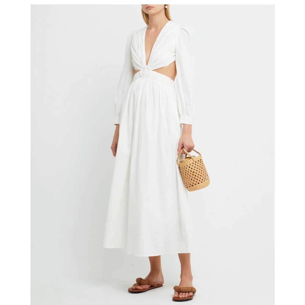 One pretty time maxi dress with cutouts. Brand new with tags